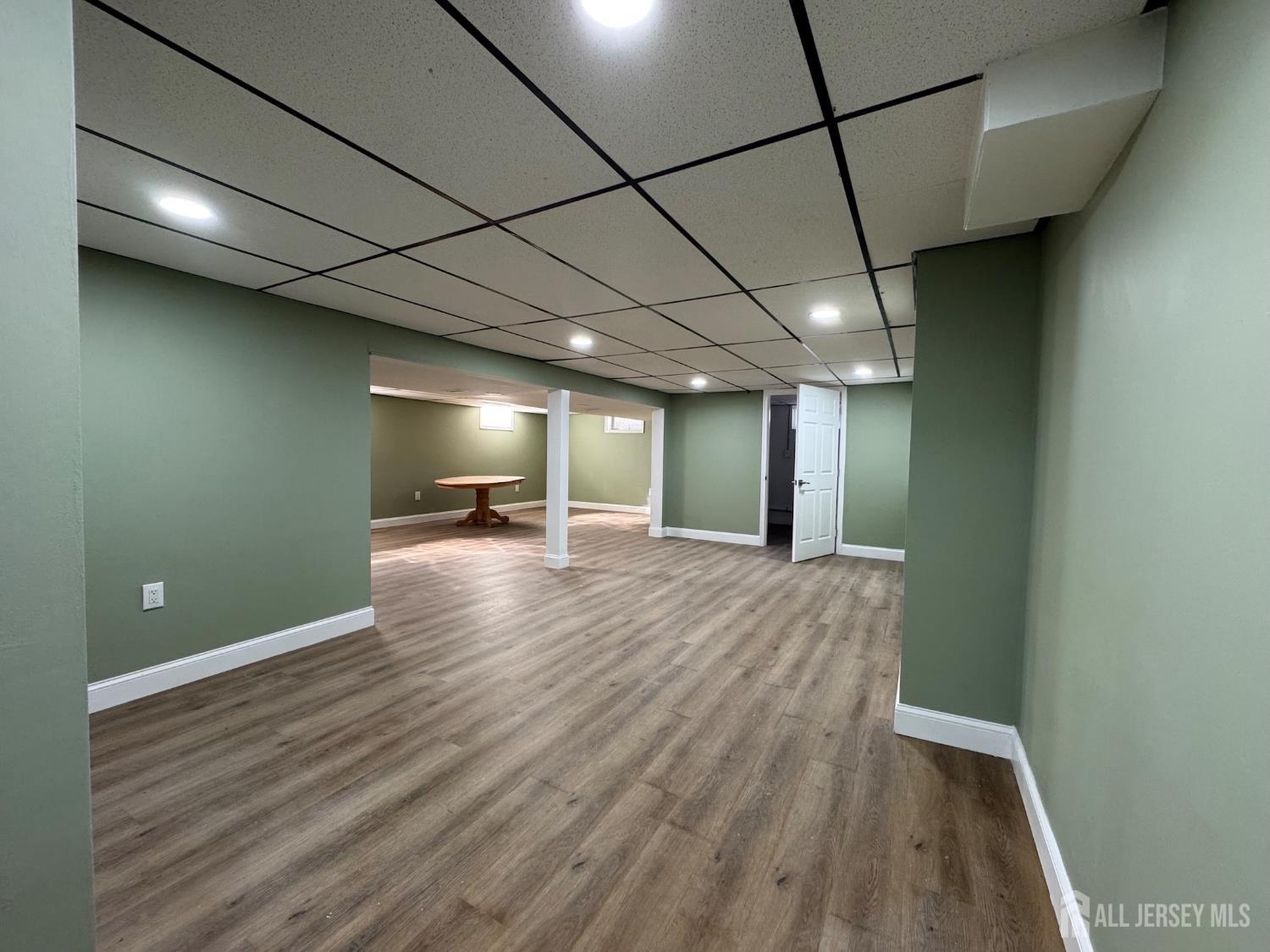 53 North Post Road West Windsor, NJ 08550 - Photo 31 of 36 a view of a room with wooden floor