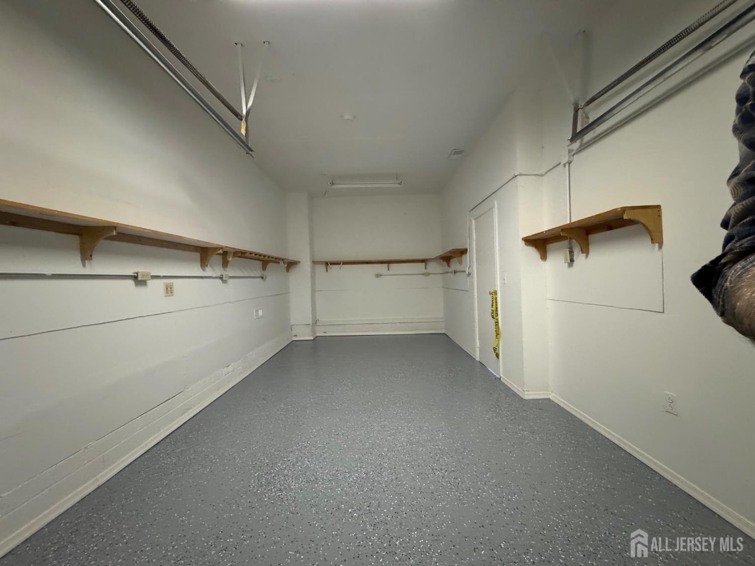 53 North Post Road West Windsor, NJ 08550 - Photo 34 of 36 a view of walk in closet with empty racks