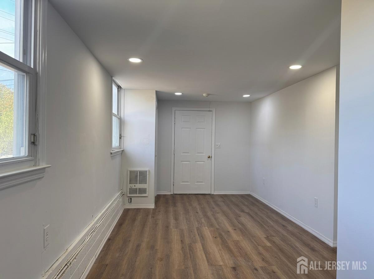 53 North Post Road West Windsor, NJ 08550 - Photo 36 of 36 a view of empty room with wooden floor