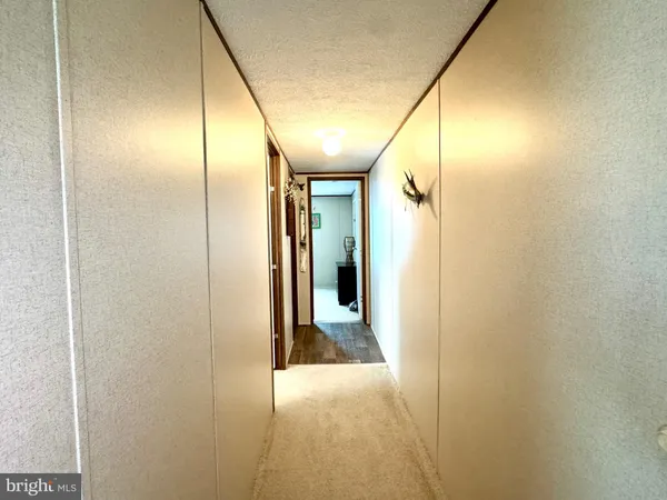 a bedroom with a bed and a table
