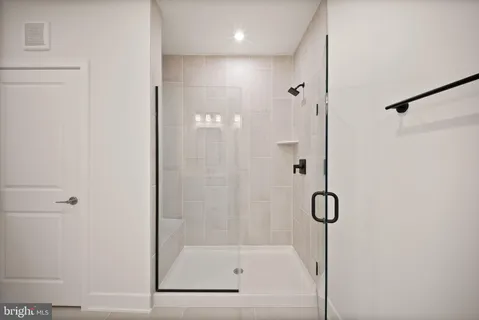 a view of hallway with closet