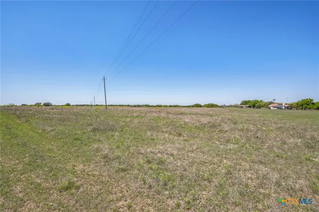 a view of a large body of water and mountain