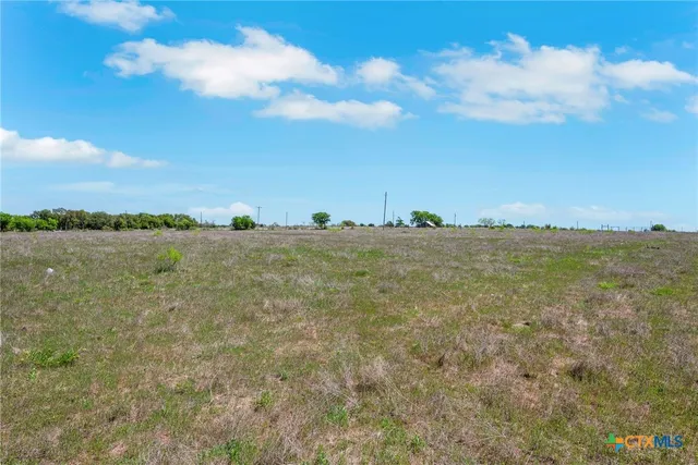a view of a house with a big yard
