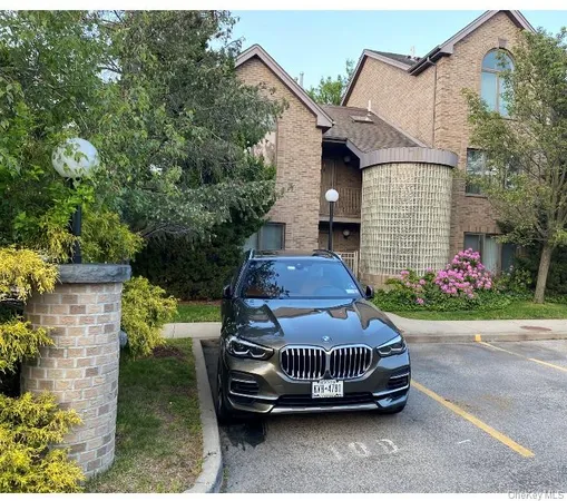 a car parked in front of a house