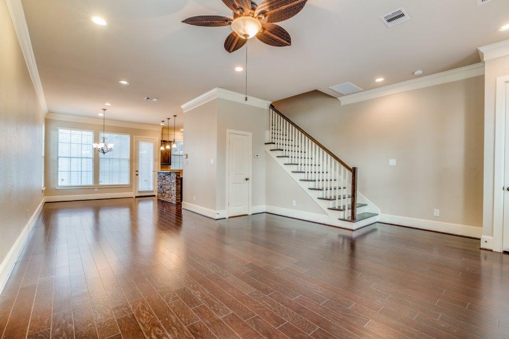 46 East Rafters Row The Woodlands, TX 77380 - Photo 5 of 25 Designed for entertaining with seamless flow from the living room into the dining area and kitchen.