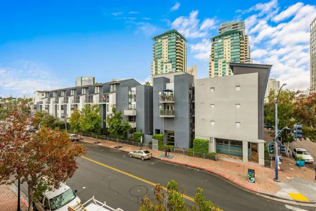 a bathroom with a sink a tub and a mirror