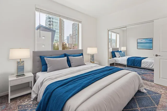 a bathroom with a sink a mirror and a shower