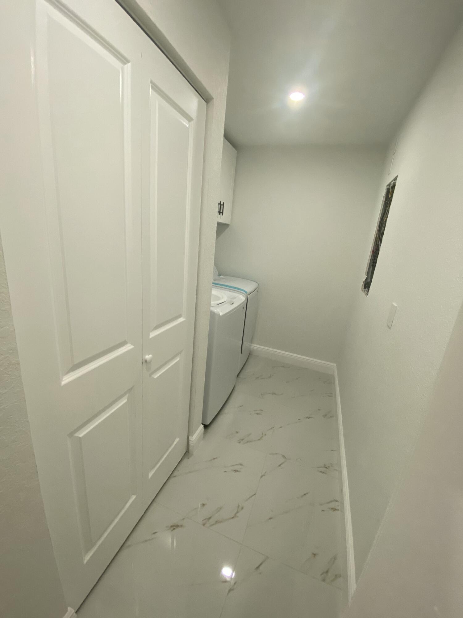 14597 Southwest 170th Avenue Indiantown, FL 34956 - Photo 17 of 31 a bathroom with a sink and toilet