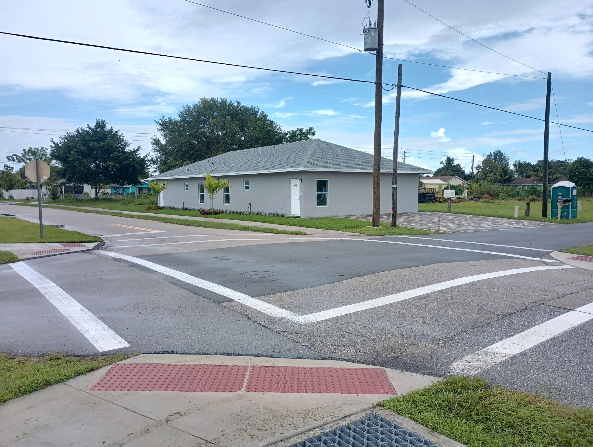 14597 Southwest 170th Avenue Indiantown, FL 34956 - Photo 8 of 31 a view of a city street with a road