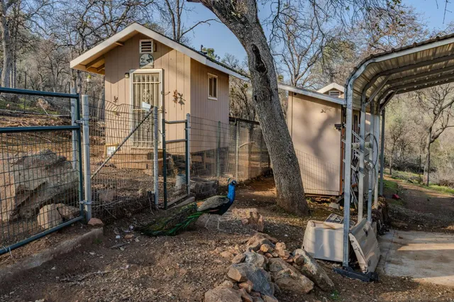 an aerial view of house with yard
