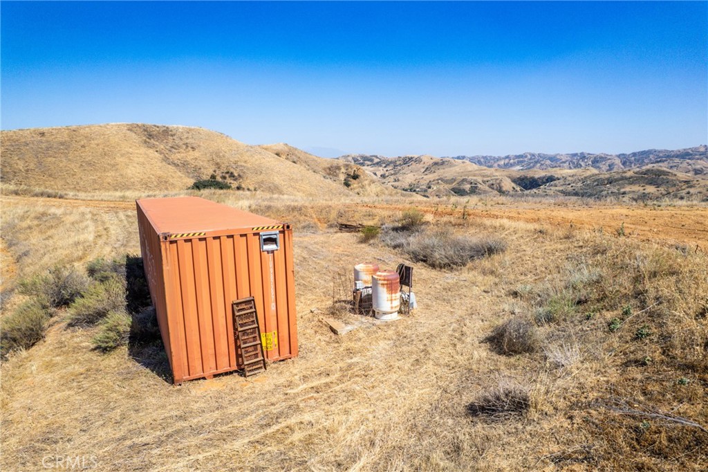 13280 Revello Road Redlands, CA 92373 - Photo 11 of 37 a view of a dry yard with wooden fence