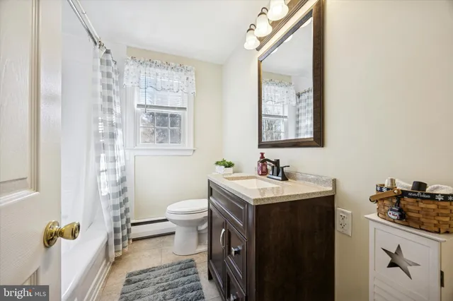 a bedroom with a bed and a cabinets