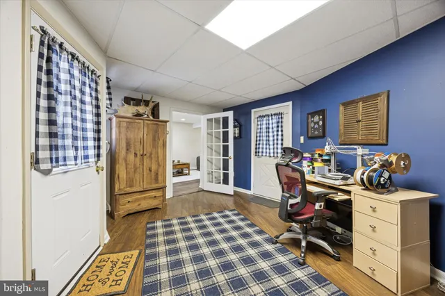 a outdoor living space with patio furniture and potted plants