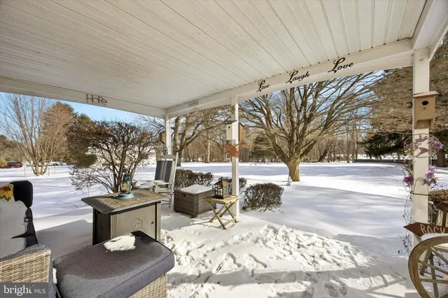 a view of a patio with a yard