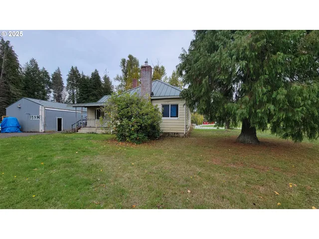 a black and white photo of a house