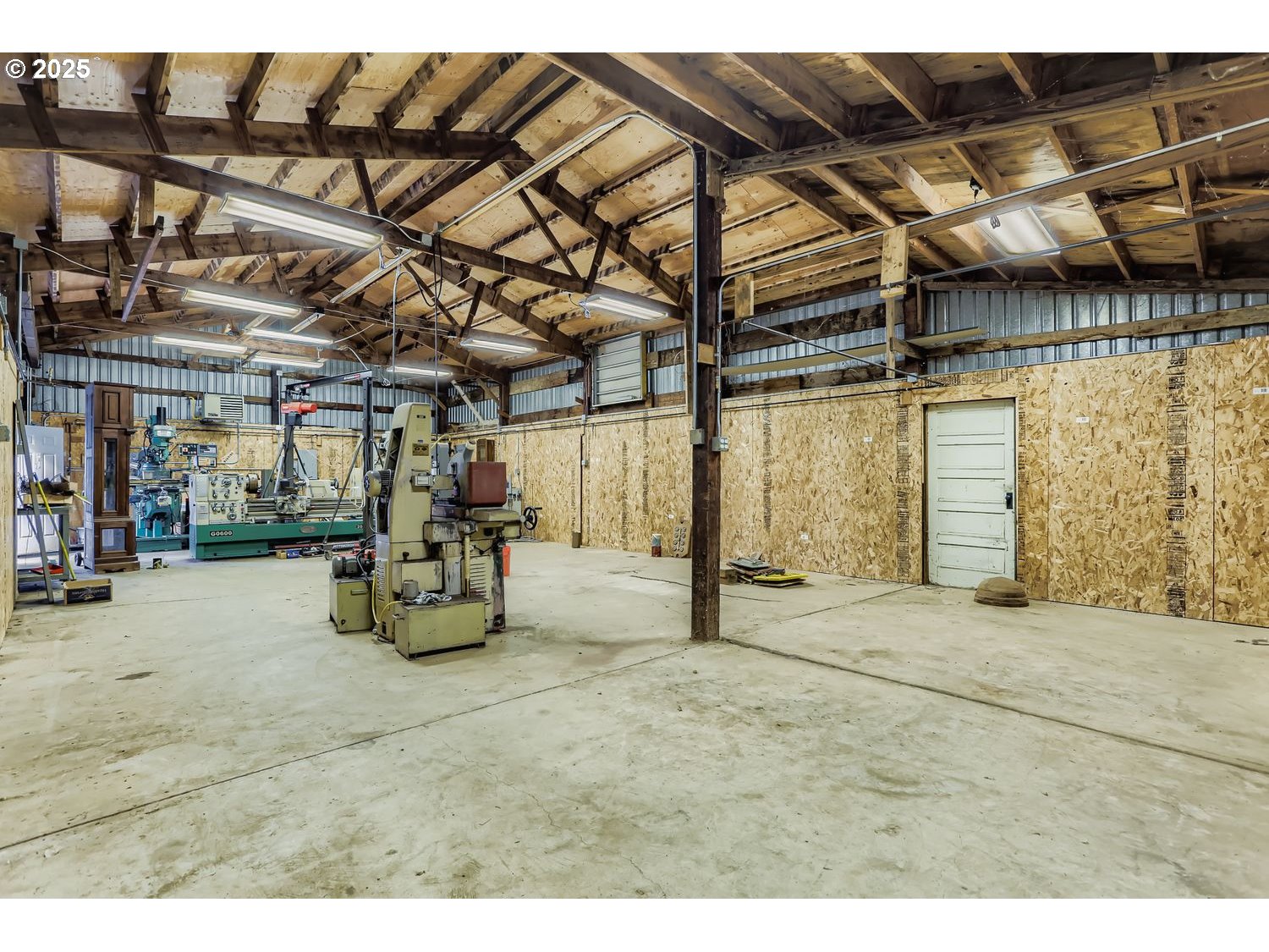 15996 South Thayer Road Oregon City, OR 97045 - Photo 20 of 25 a view of empty room with wooden floor