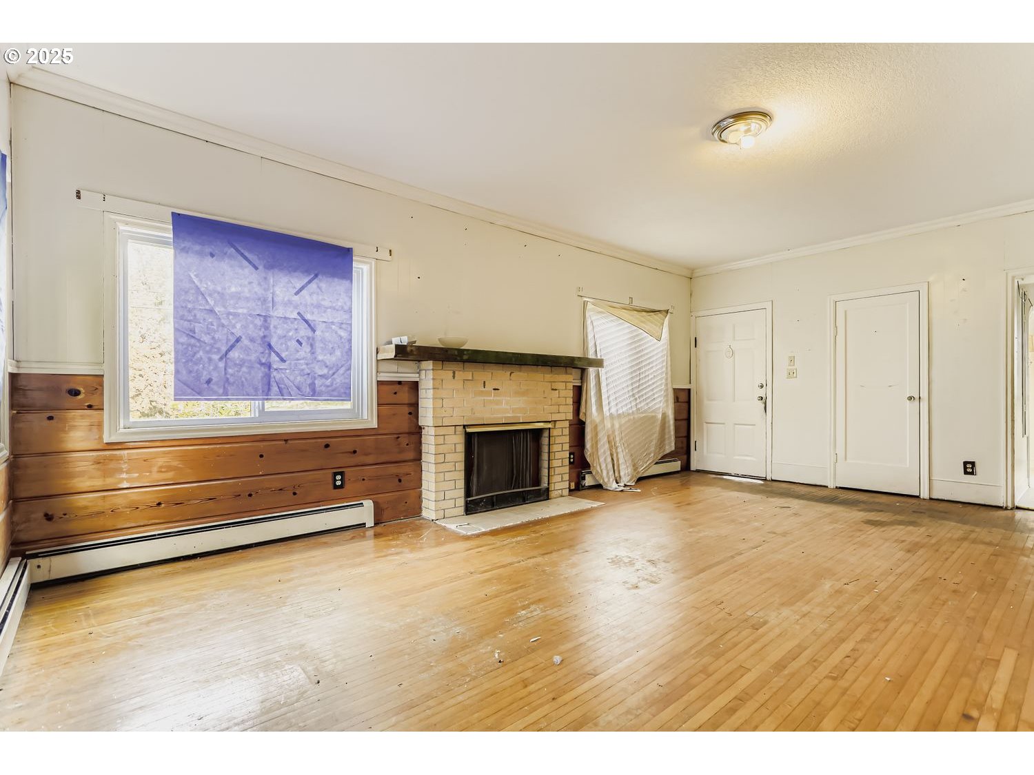 15996 South Thayer Road Oregon City, OR 97045 - Photo 5 of 25 a view of an empty room with a fireplace