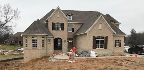 5000 Weatherford Pass, Unit 102 Franklin, TN 37064 - Photo 1 of 29 a front view of a house with a yard