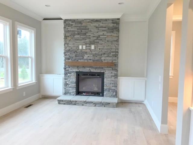 5000 Weatherford Pass, Unit 102 Franklin, TN 37064 - Photo 11 of 29 a view of empty room with fireplace