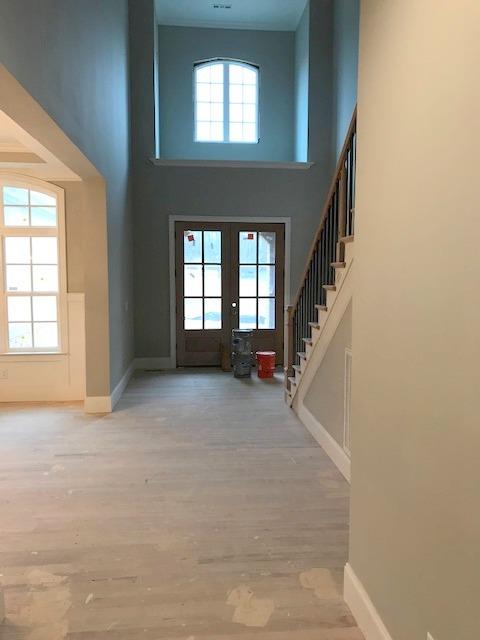 5000 Weatherford Pass, Unit 102 Franklin, TN 37064 - Photo 3 of 29 wooden floor in an empty room with a window