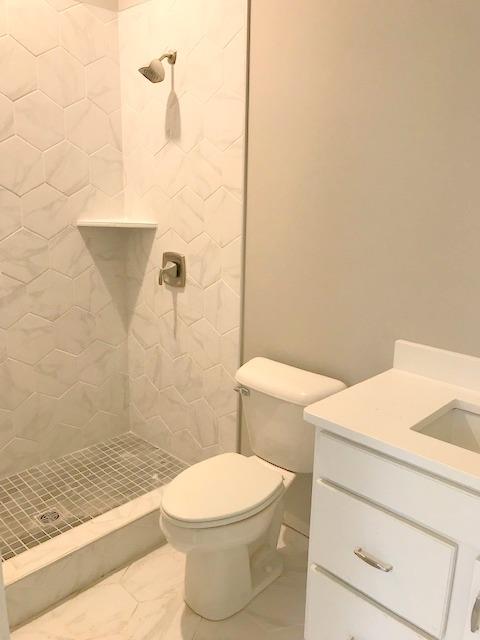 5000 Weatherford Pass, Unit 102 Franklin, TN 37064 - Photo 22 of 29 a bathroom with a toilet and a shower