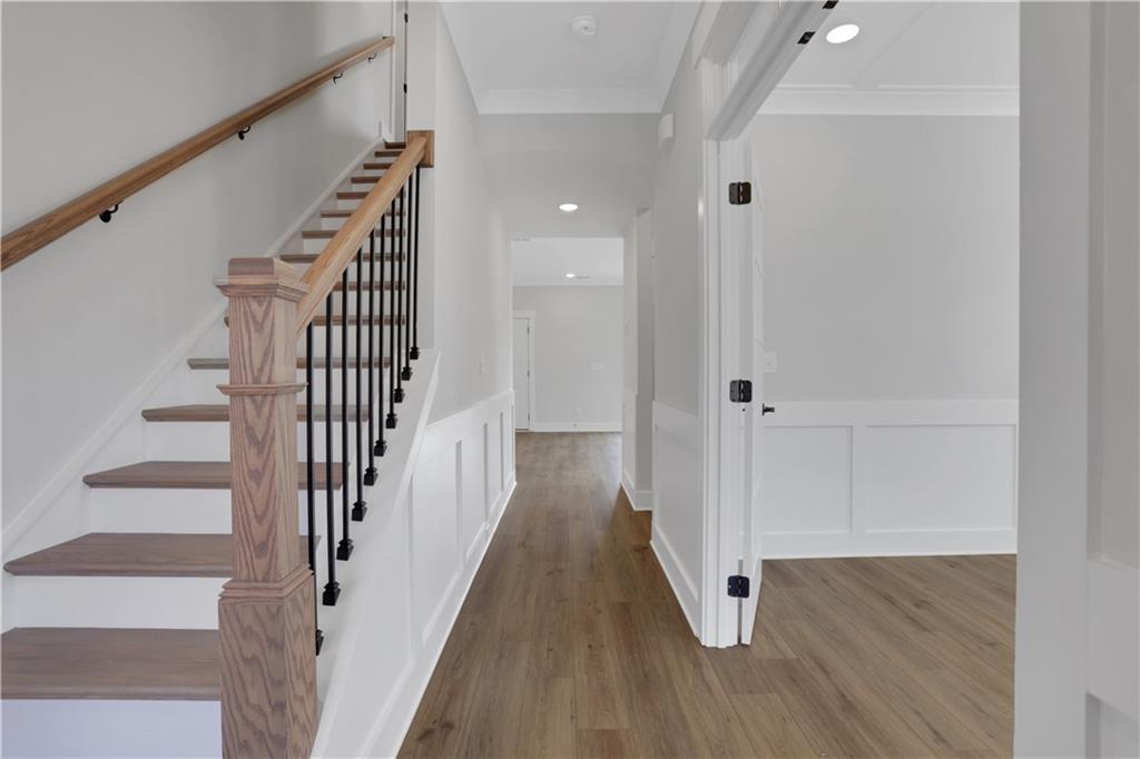 138 Marble Tree Way Ball Ground, GA 30107 - Photo 10 of 65 wooden floor in an empty room with wooden floor