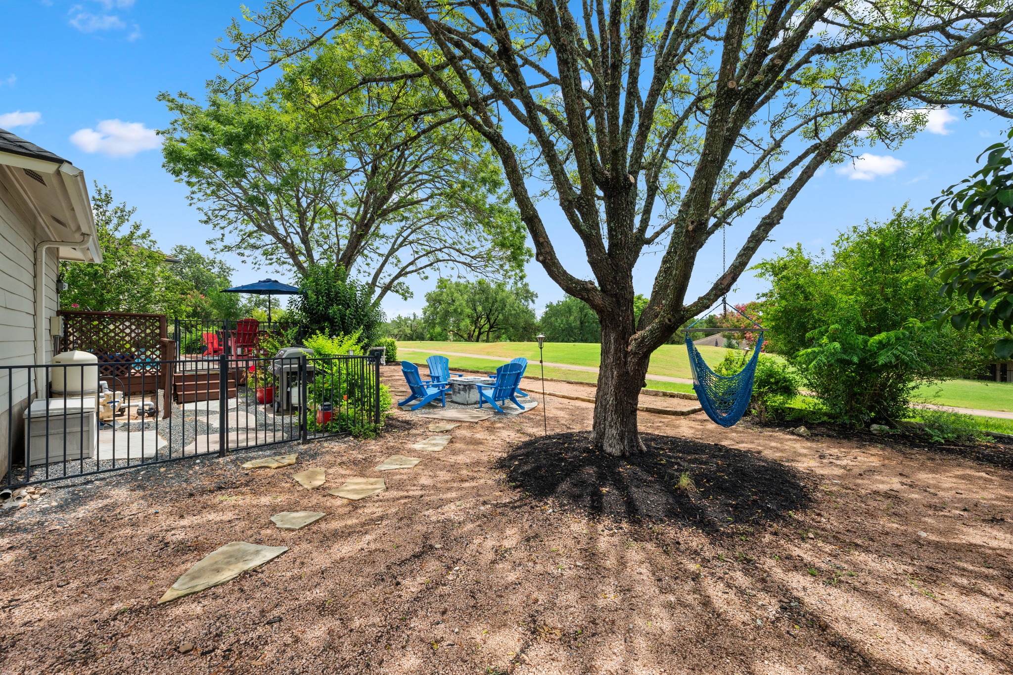 1811 Cando Court Lakeway, TX 78734 - Photo 30 of 40 More seating areas in the backyard