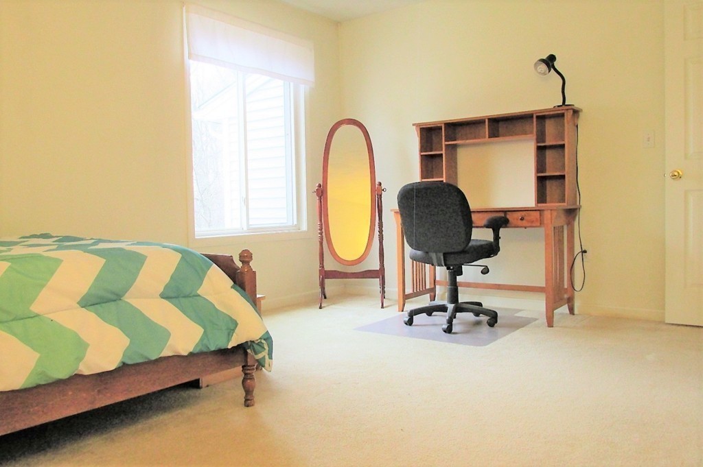 330 Sunderland Road, Unit 95 Worcester, MA 01604 - Photo 13 of 24 a living room with a couch piano and a table
