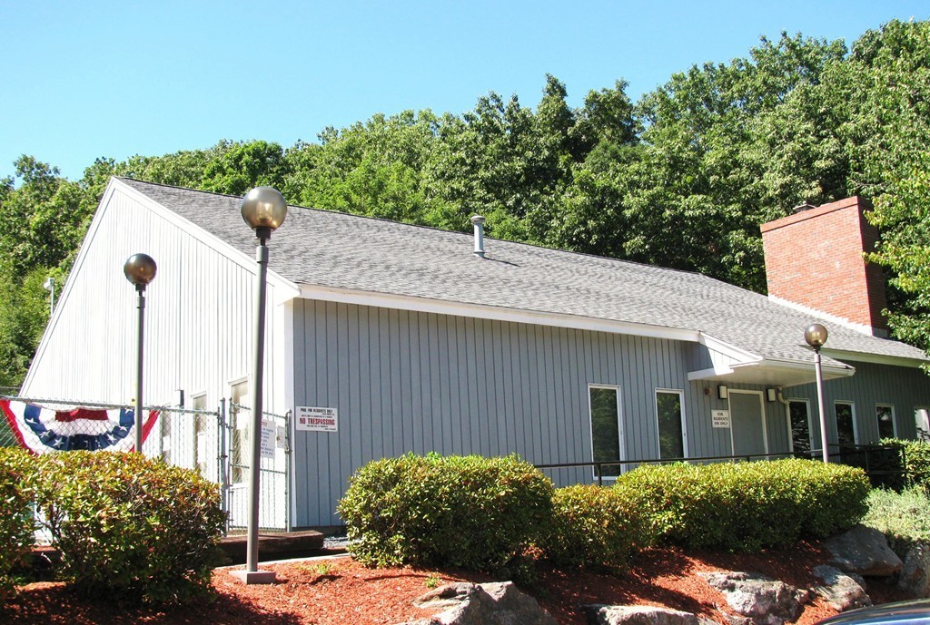 330 Sunderland Road, Unit 95 Worcester, MA 01604 - Photo 17 of 24 a view of a house with a backyard
