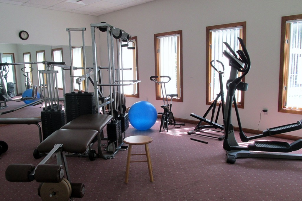 330 Sunderland Road, Unit 95 Worcester, MA 01604 - Photo 18 of 24 a view of a room with gym equipment