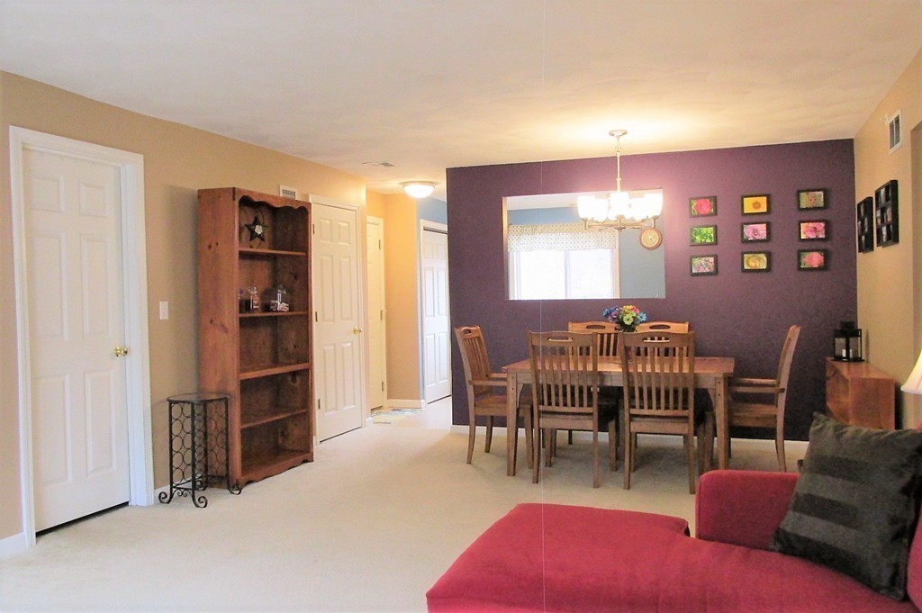 330 Sunderland Road, Unit 95 Worcester, MA 01604 - Photo 4 of 24 a livingroom with furniture and window