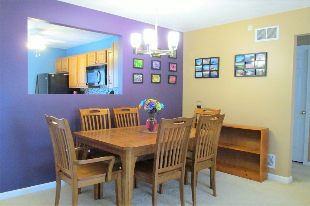 330 Sunderland Road, Unit 95 Worcester, MA 01604 - Photo 5 of 24 a view of a dining room with furniture