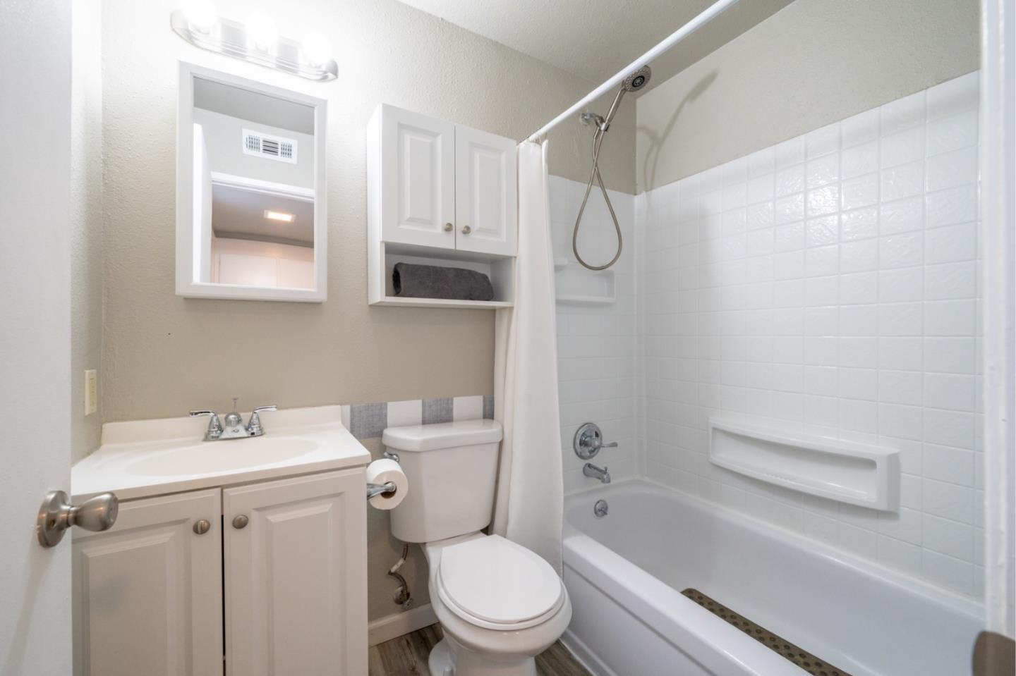 1267 Rosita Road Pacifica, CA 94044 - Photo 19 of 24 a bathroom with a sink a toilet and shower