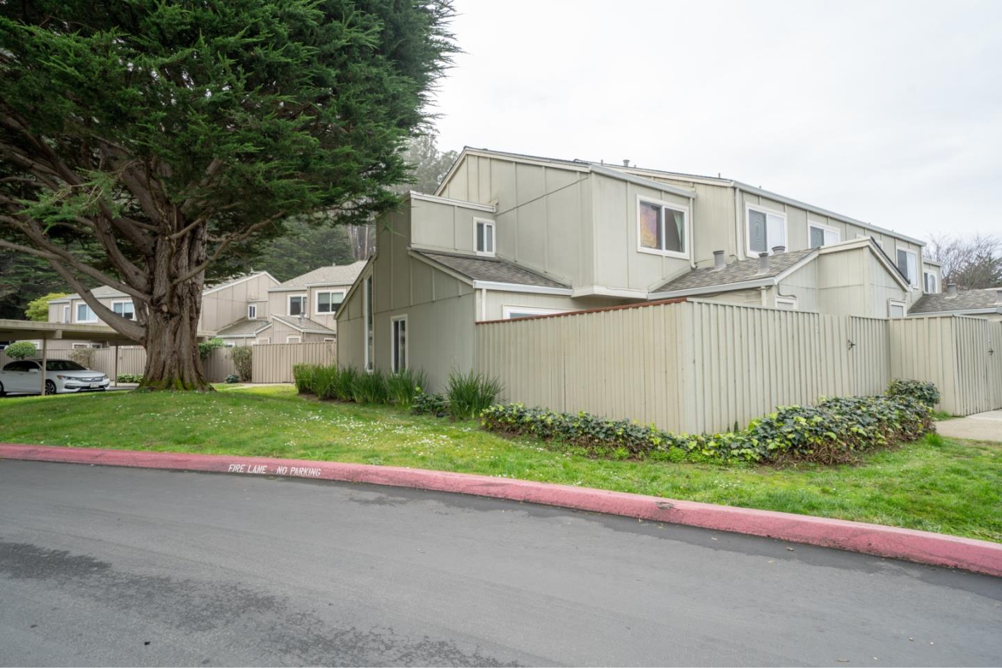 1267 Rosita Road Pacifica, CA 94044 - Photo 23 of 24 a view of a back yard of the house