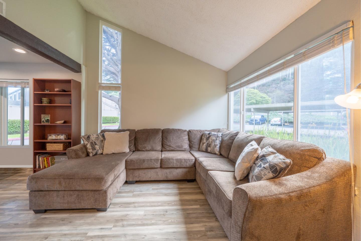 1267 Rosita Road Pacifica, CA 94044 - Photo 4 of 24 a living room with furniture and a large window