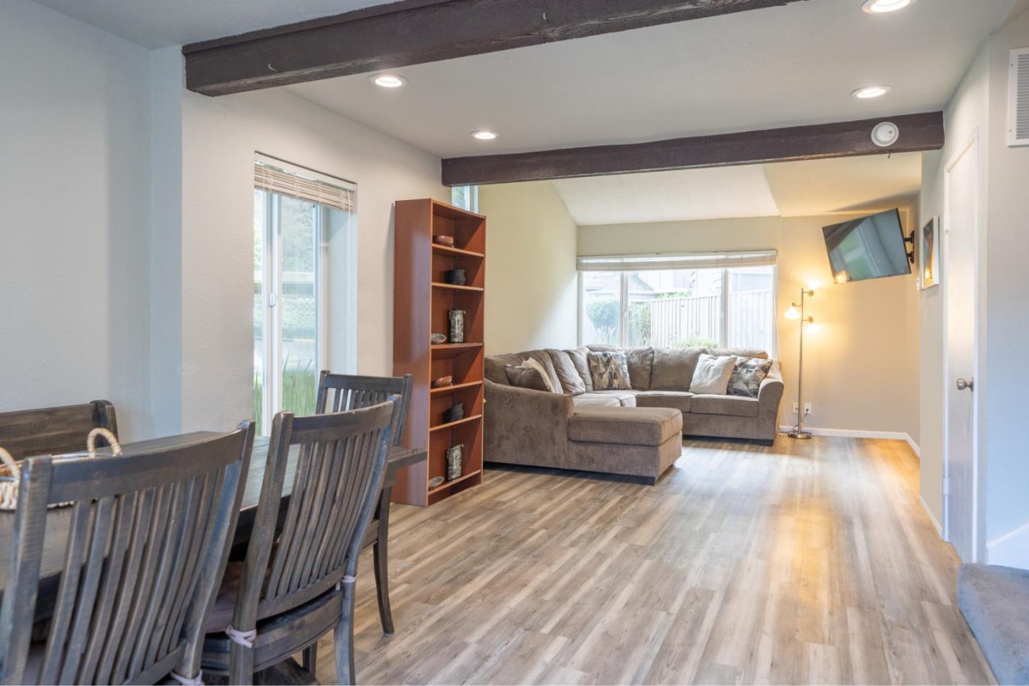 1267 Rosita Road Pacifica, CA 94044 - Photo 6 of 24 a living room with furniture and a wooden floor