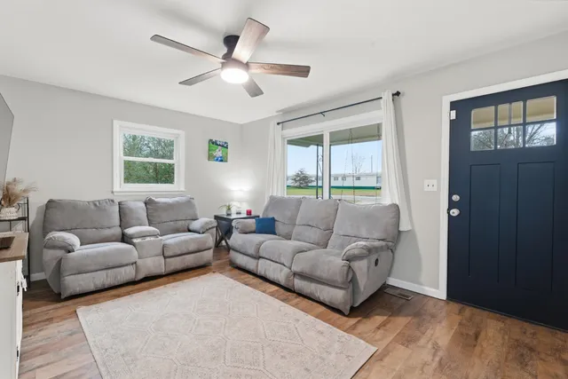 a workspace with furniture and window