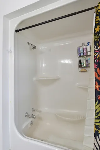a bathroom with a sink a mirror and a toilet