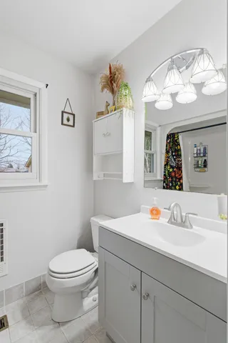 a view of livingroom with furniture and workspace