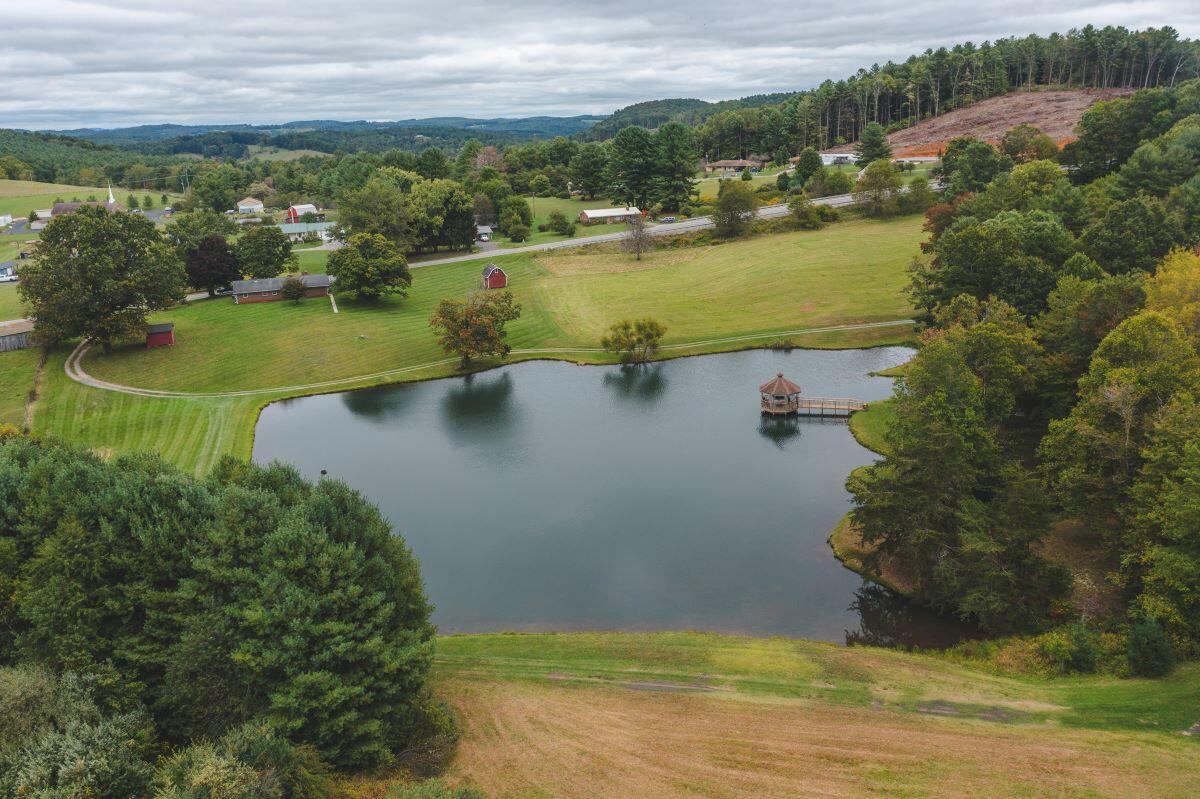 2066 Webbs Mill Road North Floyd, VA 24091 - Photo 8 of 63 a view of a lake with a city
