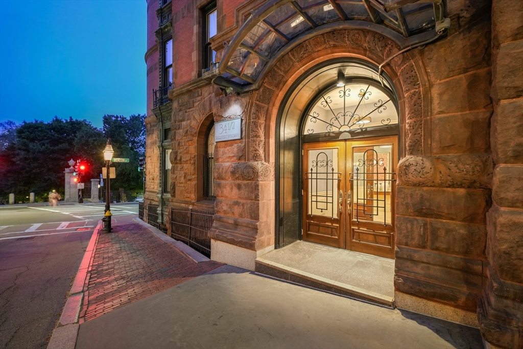 34.5 Beacon Street, Unit PH Boston, MA 02116 - Photo 11 of 11 a view of a brick house with a large windows