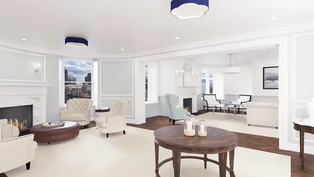 a living room with furniture couches and a fireplace