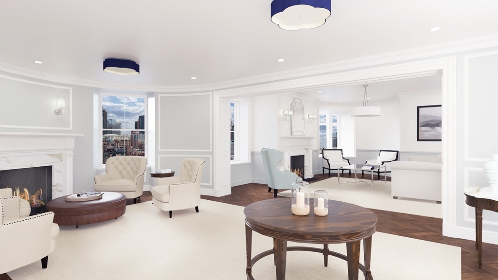 34.5 Beacon Street, Unit PH Boston, MA 02116 - Photo 4 of 11 a living room with furniture couches and a fireplace