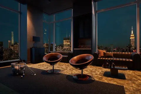 a kitchen with a table and chairs