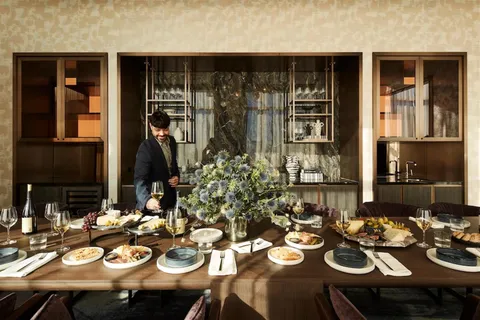 a view of a dining table and chairs in the patio