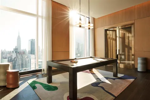 a room with furniture and a window