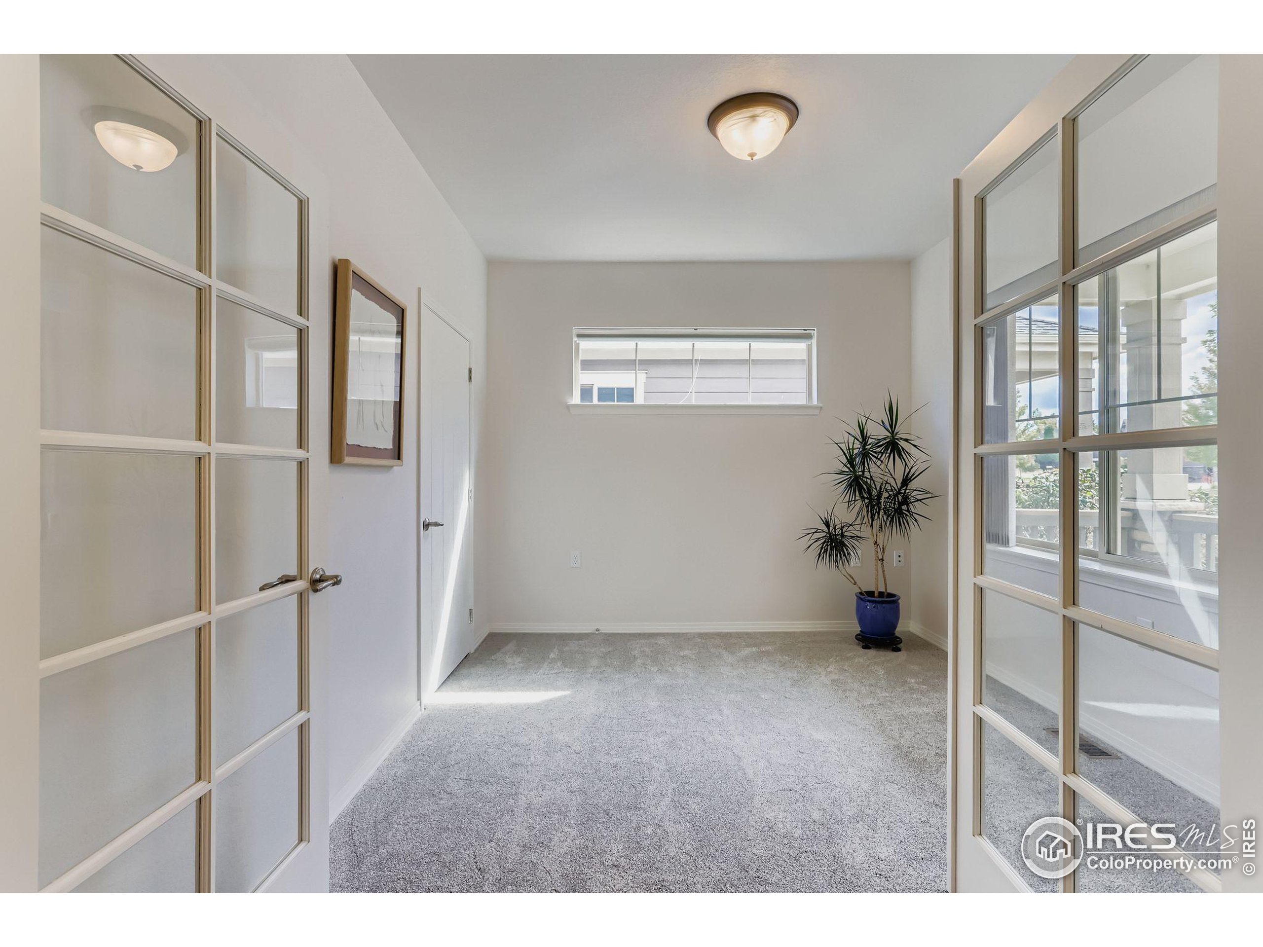 671 Brennan Circle Erie, CO 80516 - Photo 3 of 26 a view of an empty room