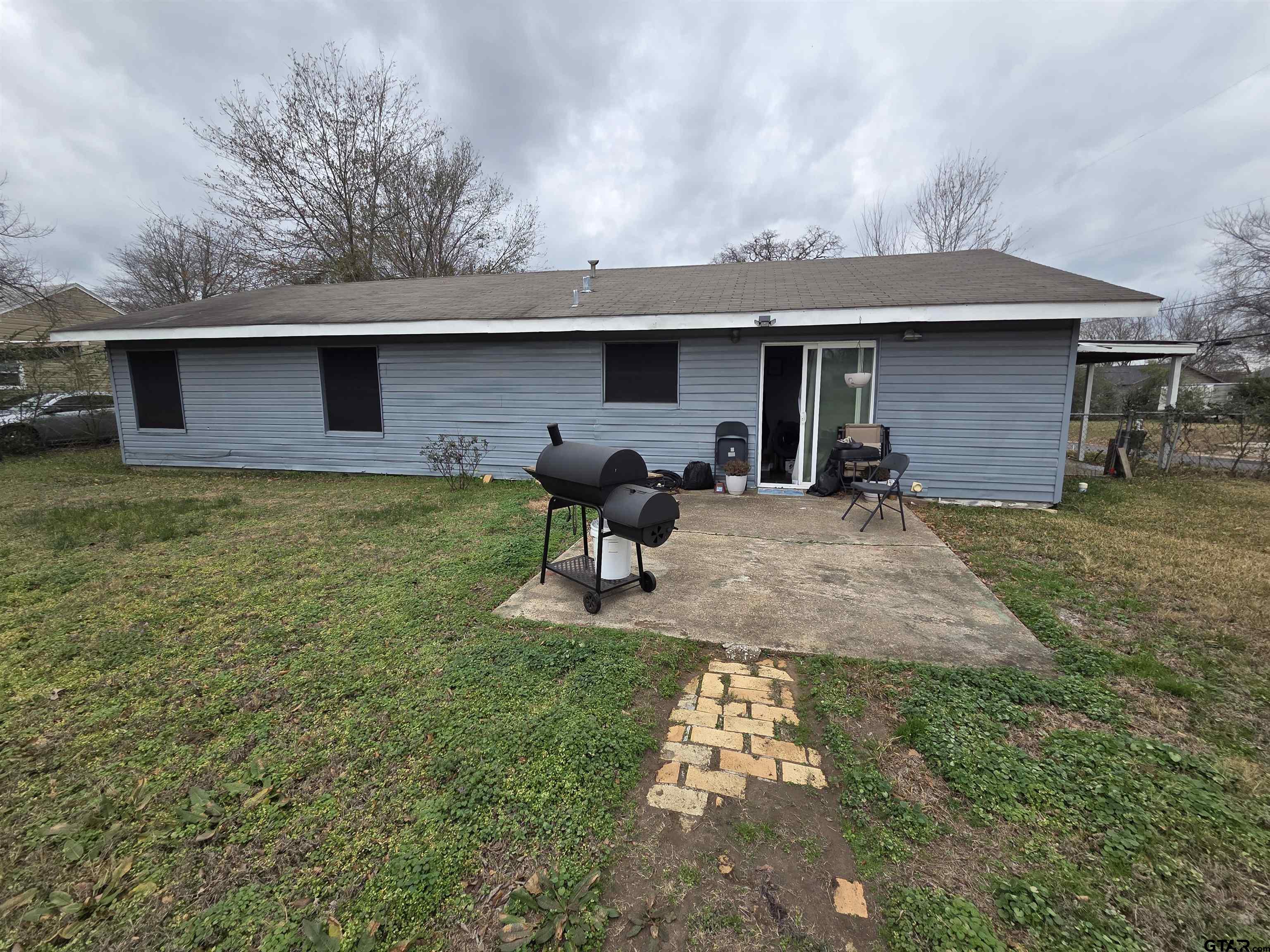 124 Foscue Street Sulphur Springs, TX 75482 - Photo 2 of 8 a front view of a house with garden