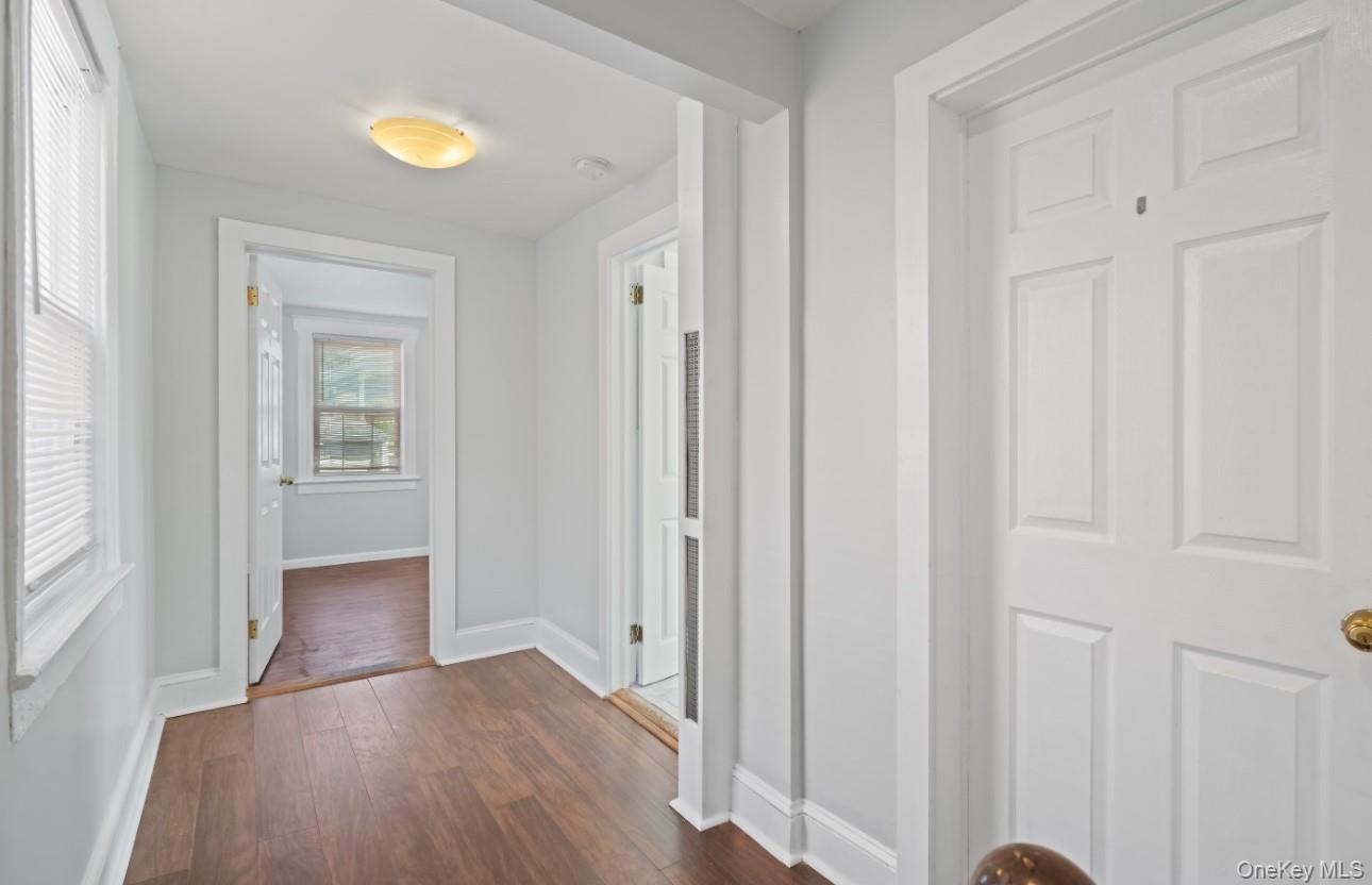 17 Edgar Place Port Chester, NY 10573 - Photo 12 of 18 Hallway featuring dark wood-type flooring