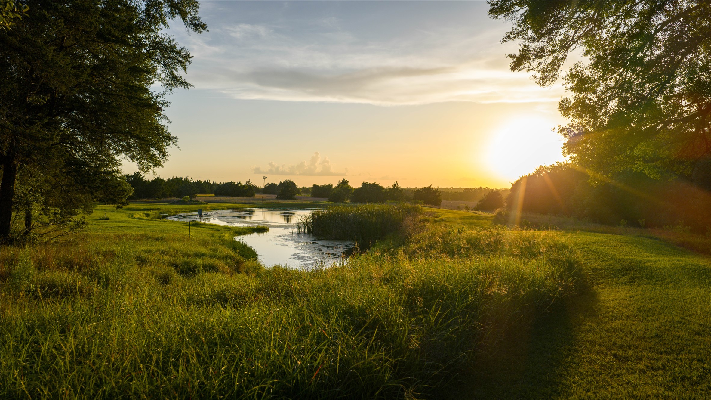 2080 Zimmerscheidt Road Columbus, TX 78934 - Photo 1 of 15 a view of a lake with houses in the back